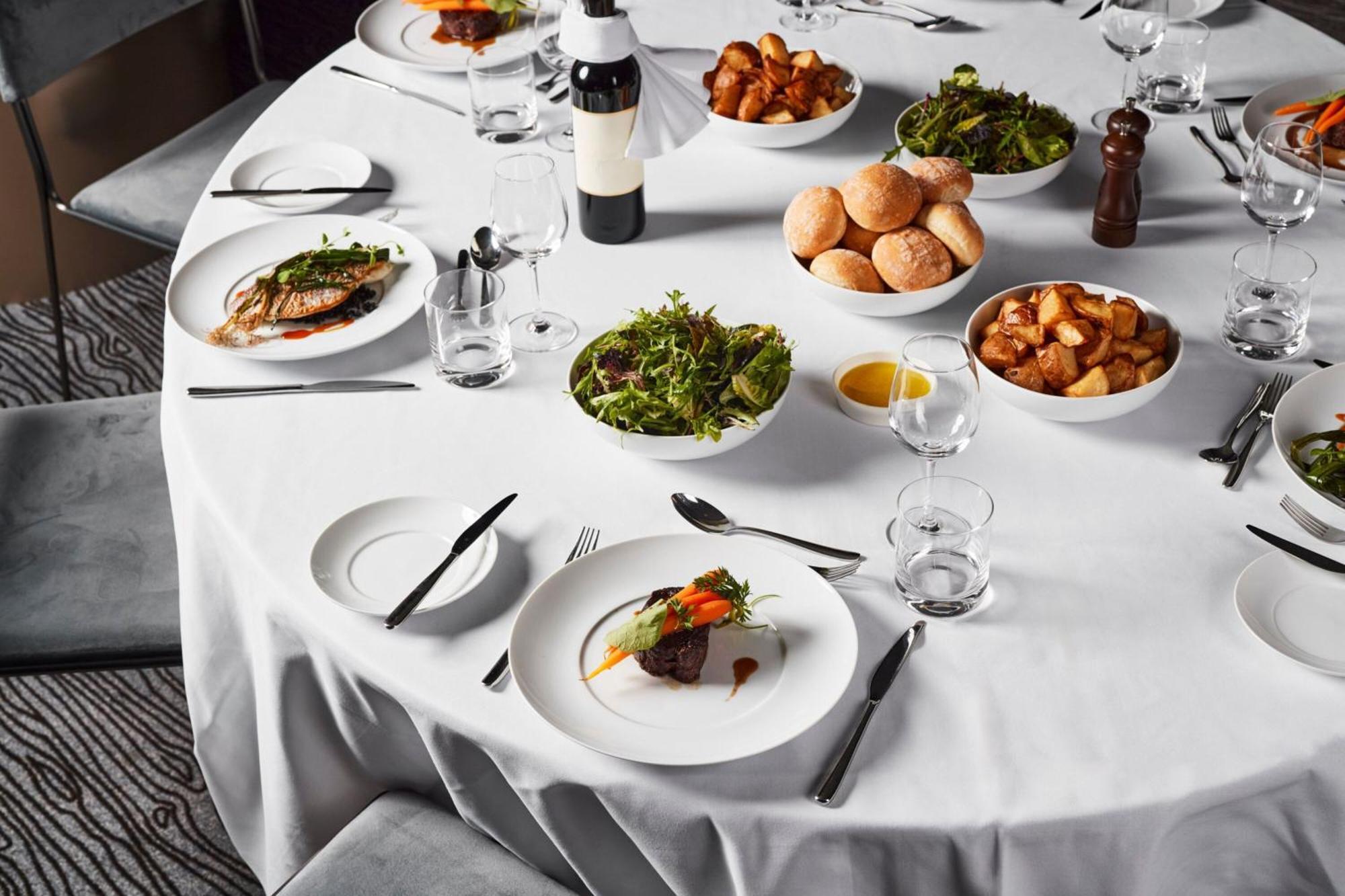 Melbourne Marriott Hotel Docklands Kültér fotó A table set for a formal dinner